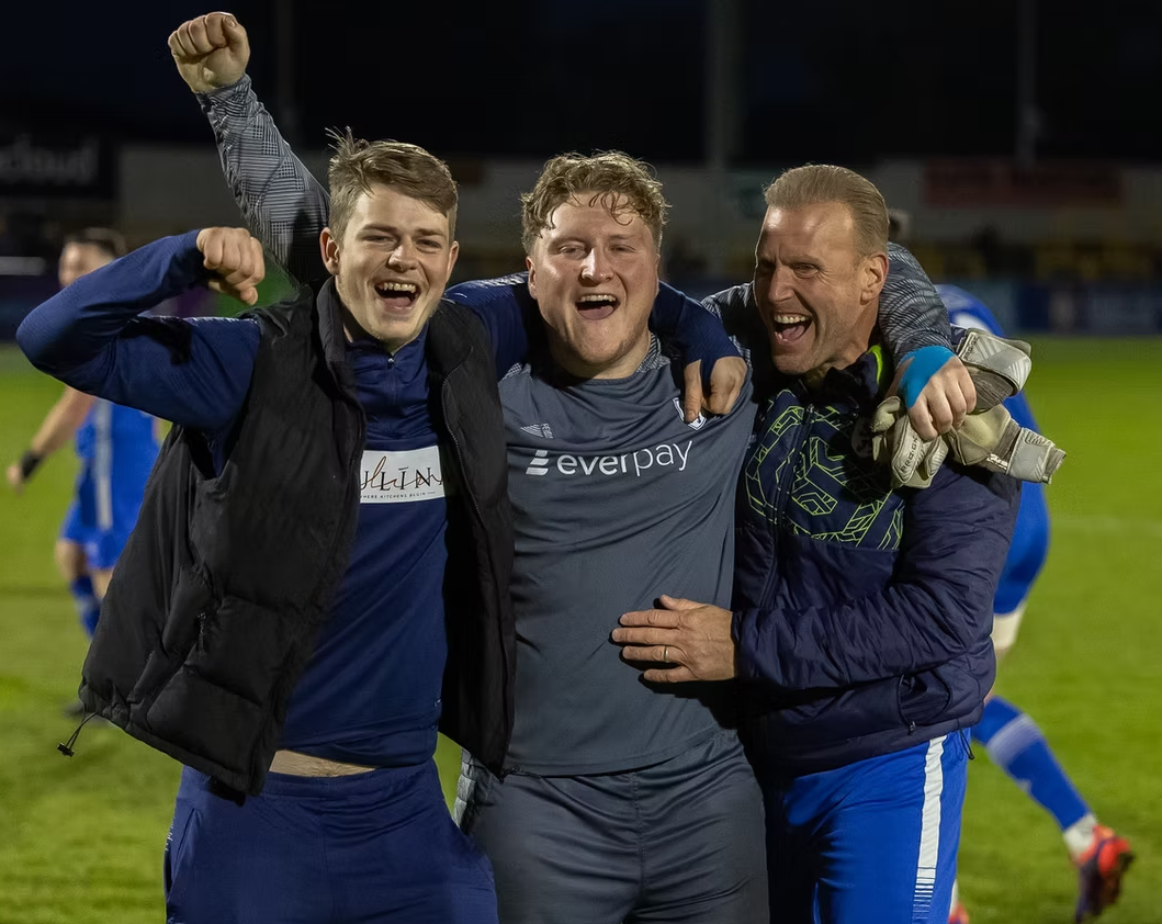 Three Worcester Park players celebrating together after a match